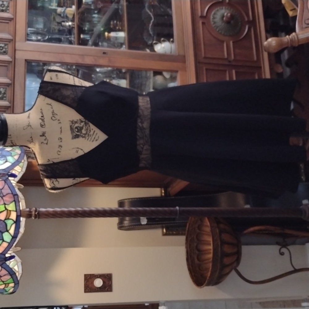 BCBGeneration black fit and flare with lace size 6 very cute dress. Worn once.